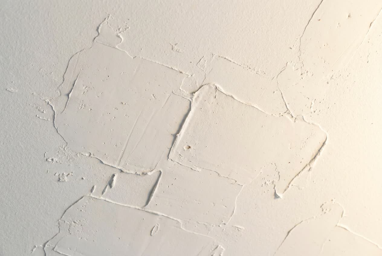 Knockdown texture ceiling finish in New Smyrna Beach FL - flattened splatter pattern by JPL Painting